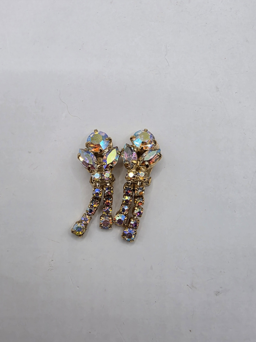 Vintage Mid-Century Aurora Borealis Rhinestone Dangling Clip-On Statement Ear.